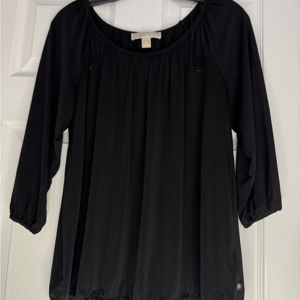 Michael Kors black top in size medium, 95%polyester and 5% Spandex